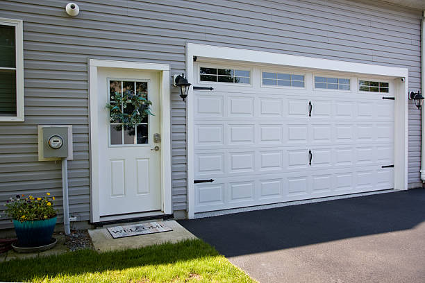 24/7 Emergency Garage Door Panel Replacement experts in Normal, IL